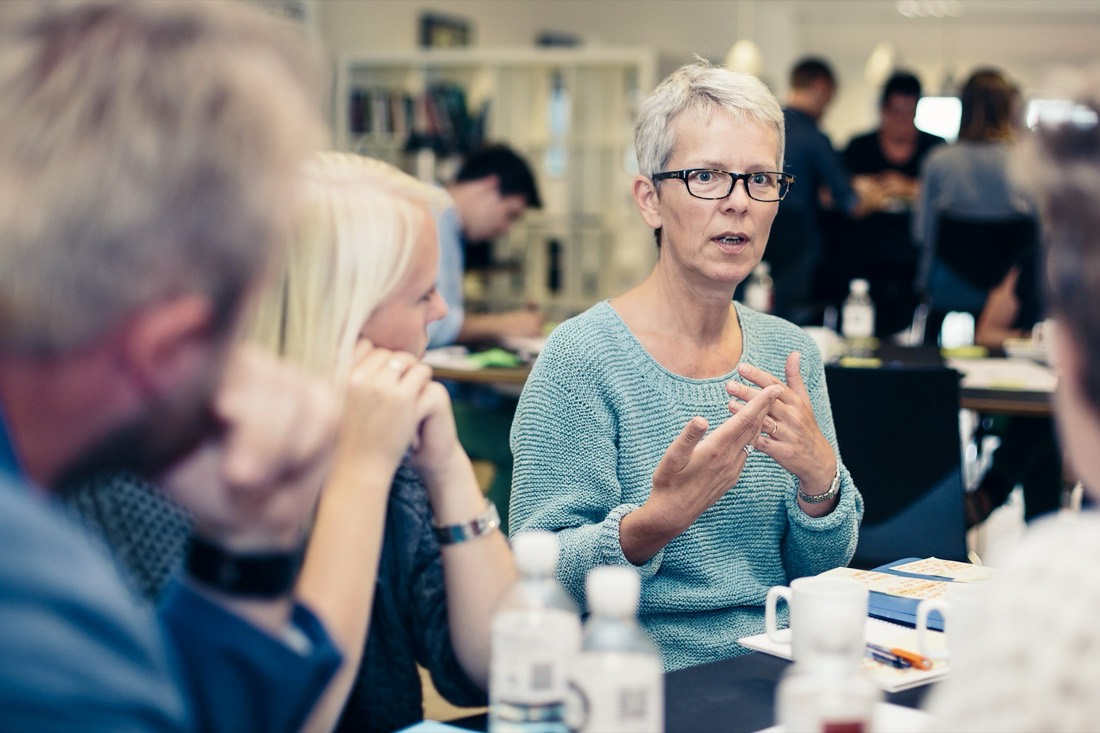 Deltagere arbejder sammen under en faciliteret proces — Guldborgsund Kommune